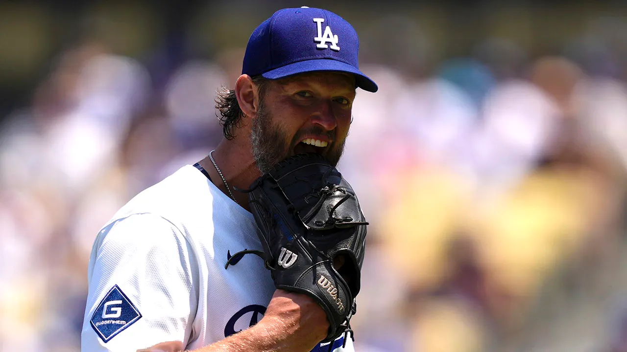 Dodgers’ Clayton Kershaw slams glove, hat in frustration
